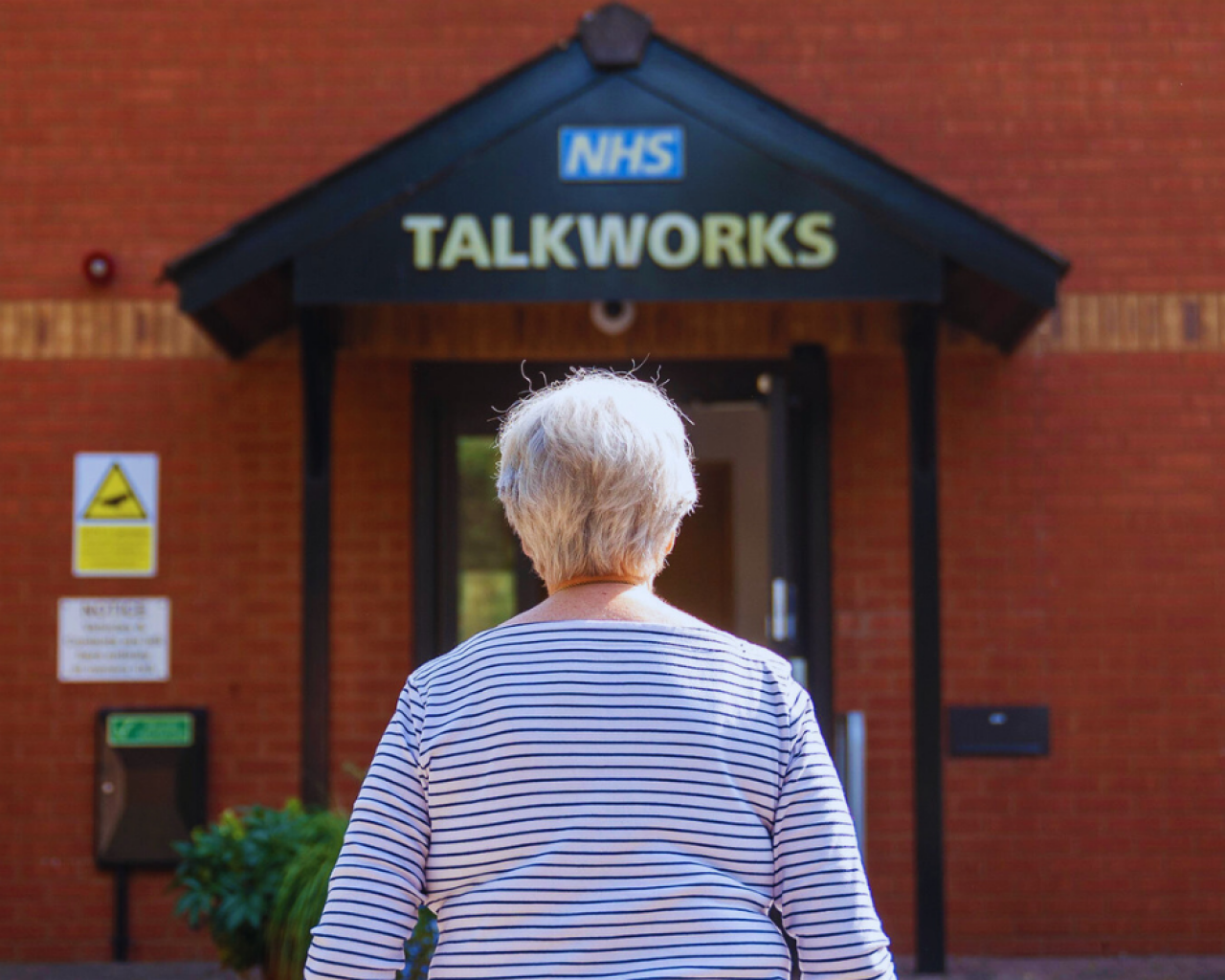 Older adult walking to appointment (1)